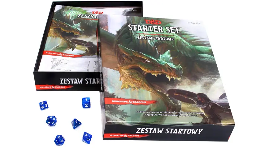 Zestaw startowy Dungeons & Dragons z kostkami. Smok i rycerz na okładce zapraszają do przygody.