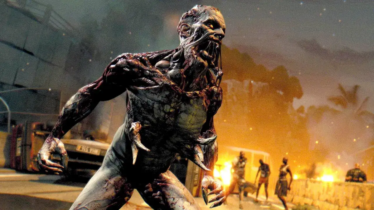 Potwór z Dying Light, The Beast, z odsłoniętymi zębami i krwawiącym ciałem, na tle płonącego miasta.